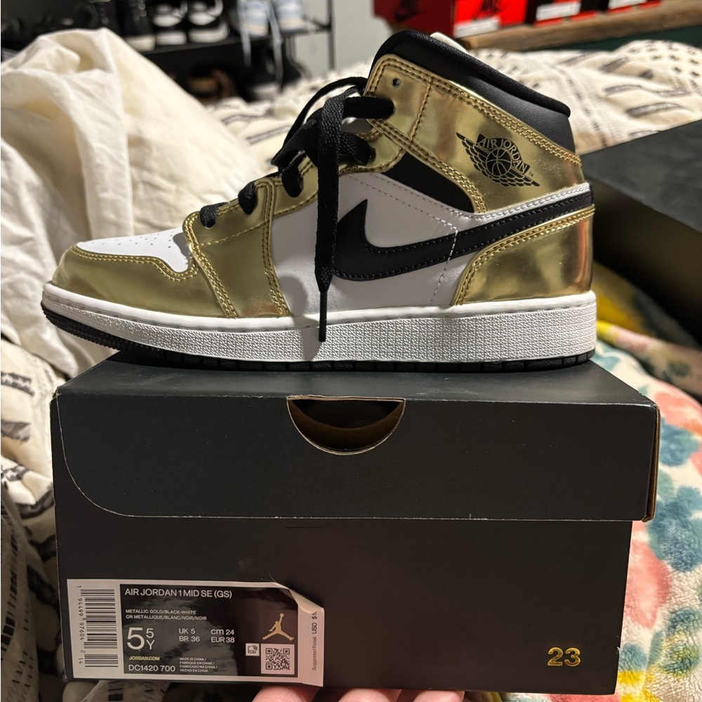 Air Jordan 1 Mid SE Gold and Black Sneakers